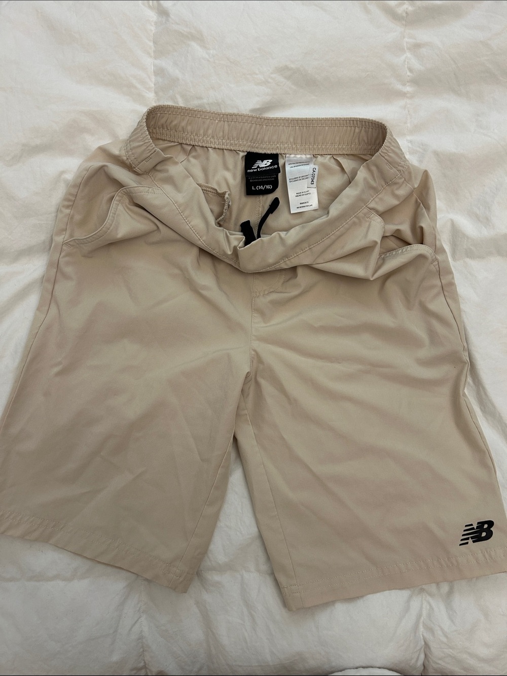 New Balance Men's Tan Athletic Shorts with Black Drawcord